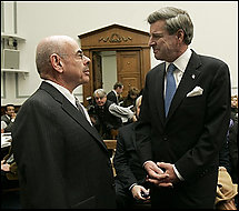 House Oversight and Government Reform Committee Chairman Rep. Henry Waxman, D-Calif., left, greets L. Paul Bremer III, the former U.S. occupation chief in Iraq on Capitol Hill in Washington, Tuesday, prior to the committee's hearing on waste, fraud and abuse dealing with Iraqi reconstruction. (Susan Walsh - AP) 