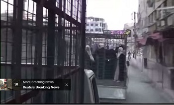 Phe nổi loạn Syria bắt người nhốt trong lồng làm bia đỡ đạn