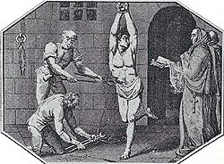 Two priests demand a heretic to repent as he is tortured.- Ảnh http://en.wikipedia.org/wiki/Spanish_Inquisition